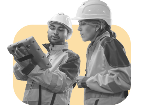 Real-time job quotes with FieldConnect Two field technicians reviewing a real-time job quote on a tablet